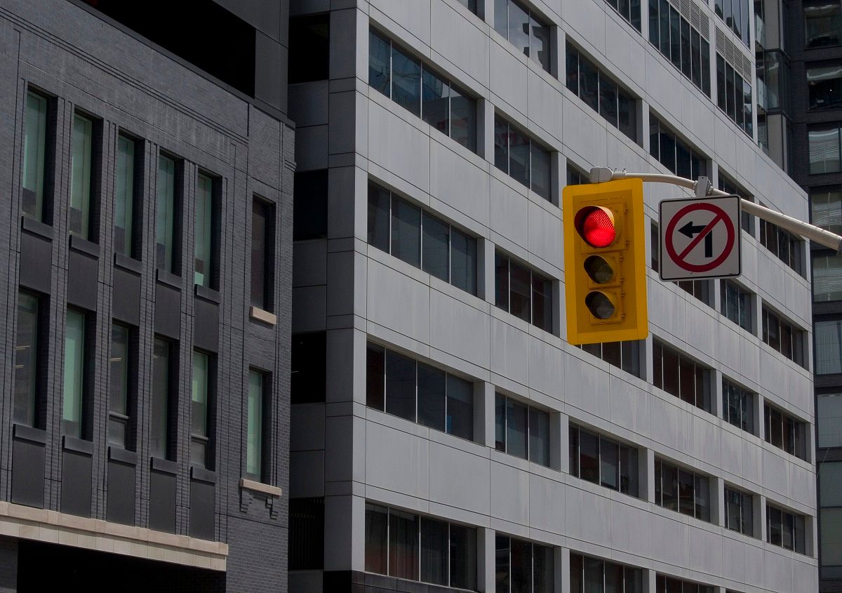 Red Traffic Light over Street Intersection