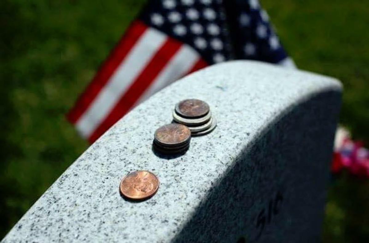 coins on military graves headstones cemetery cemeteries funeral coin