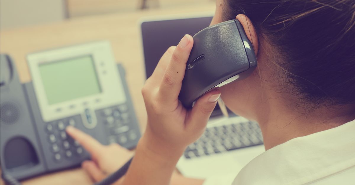 Woman answering phone at call center