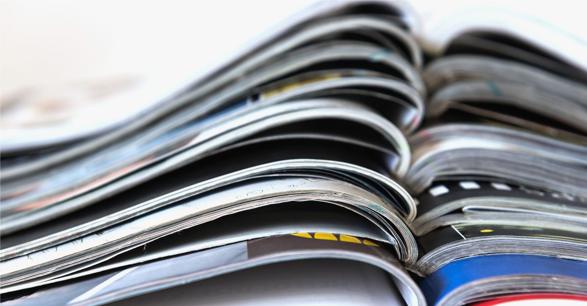 Stack of open magazines