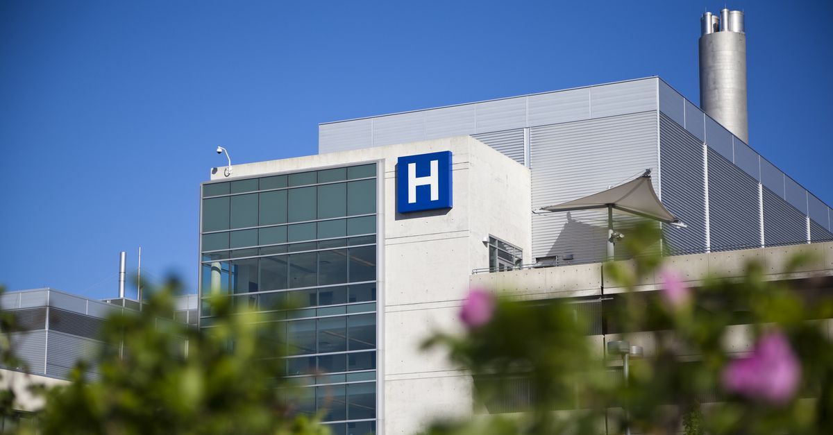 Hospital building under blue sky