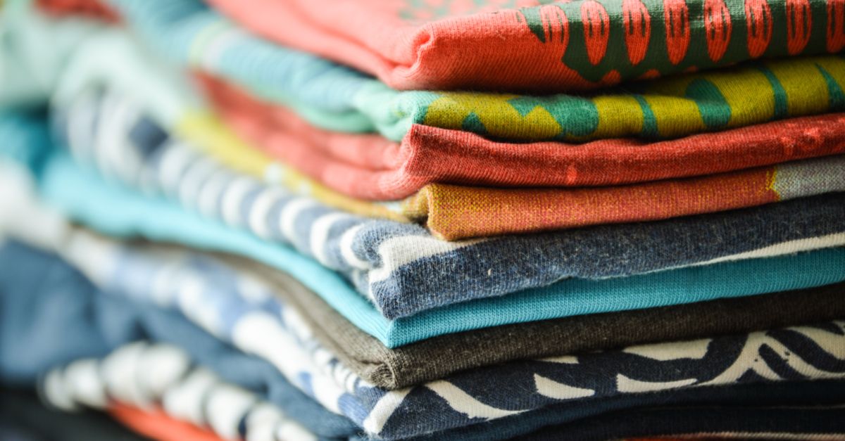 A stack of folded T-shirts.