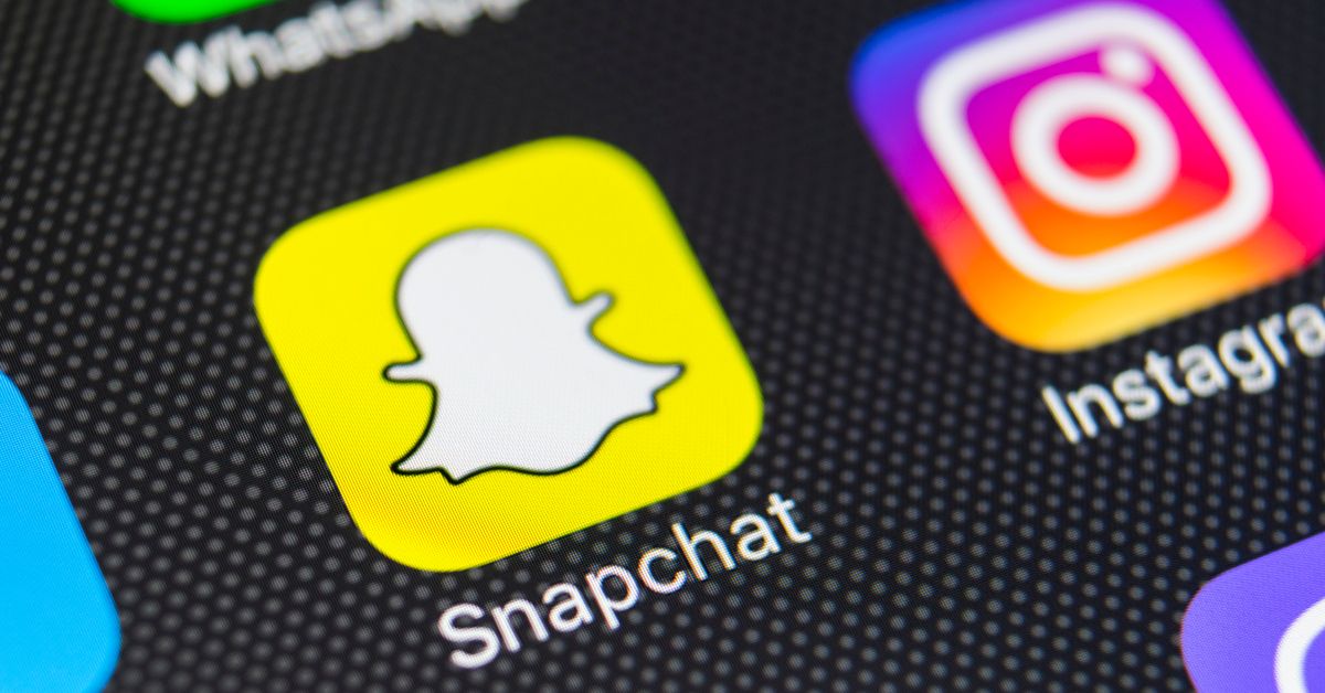 Snapchat logo on a mobile phone.