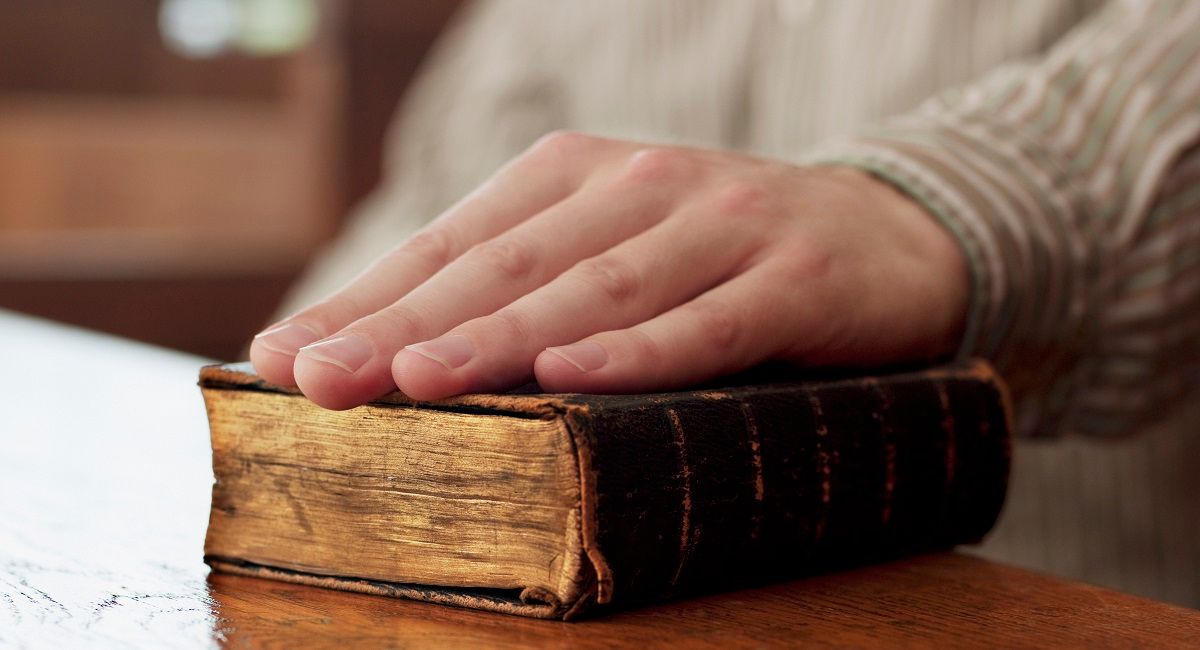 swearing in court on a Bible, so help me God