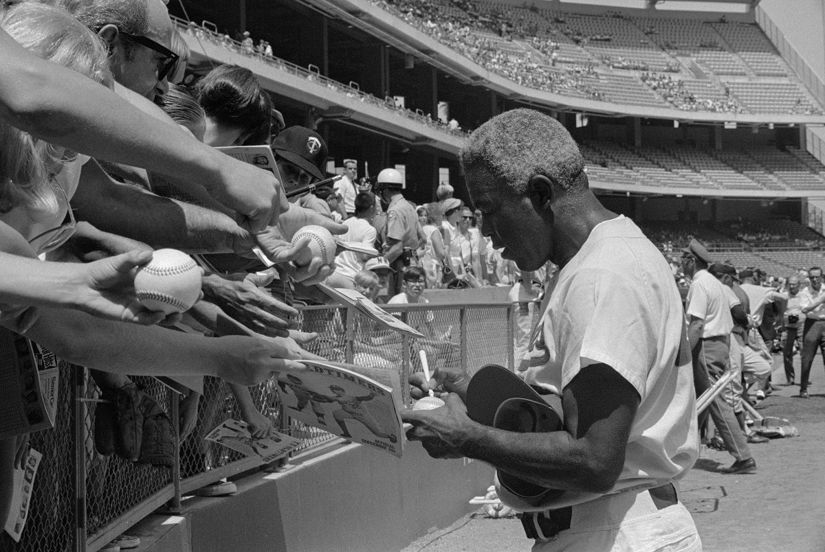 Jackie Robinson Signing Autographs