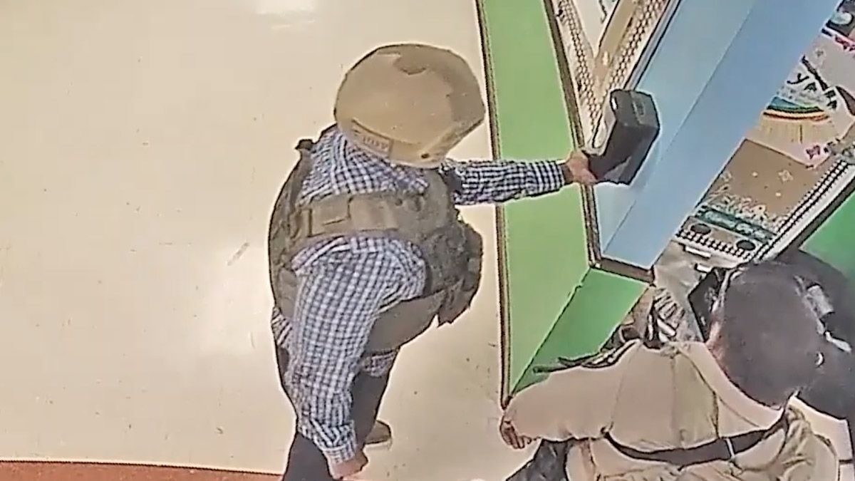 Surveillance video really did show a man who may have been a police officer using a hand sanitizer station while other officers waited a total of 80 minutes before engaging the shooter at Robb Elementary School in Uvalde, Texas.