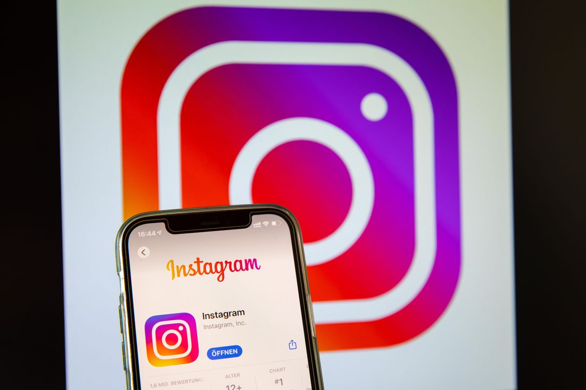 The Instagram app is shown in front of a full image of the Instagram icon.
