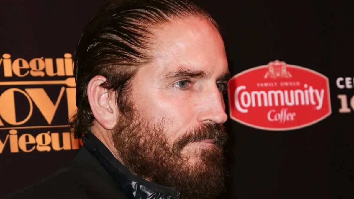 The left side of a white man's face looks at a 90-degree angle from the camera.