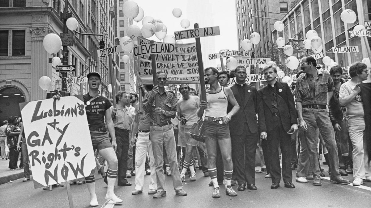 A group of people are gathered together. To the left, "Lesbians + GAY Right's NOW".