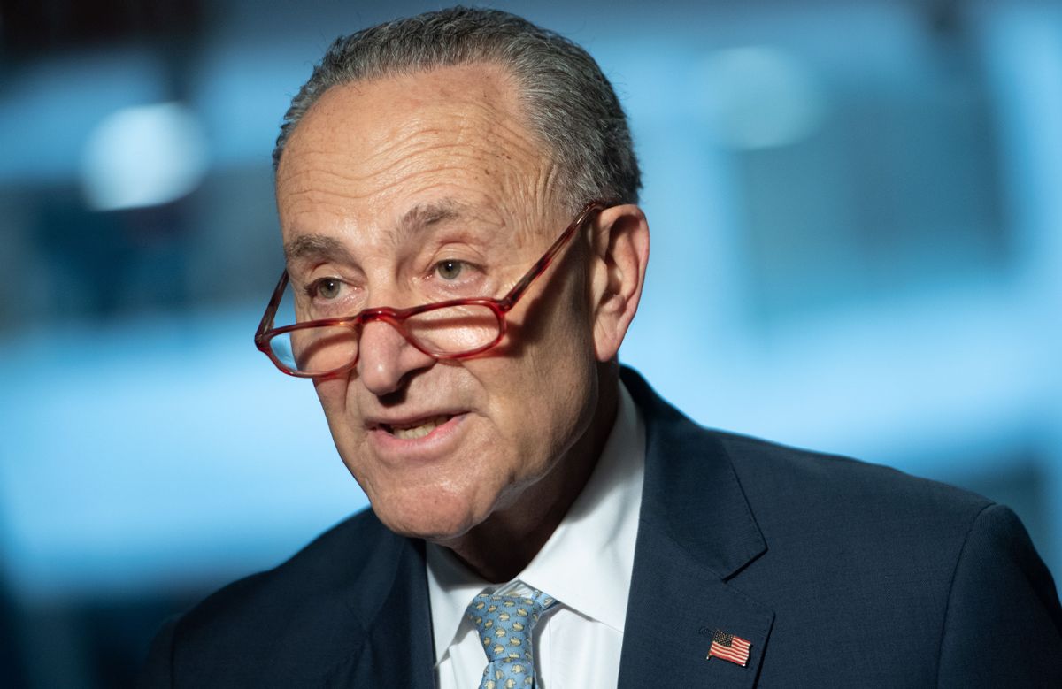Chuck Schumer, a white man wearing a dark blue suit, appears to be speaking.