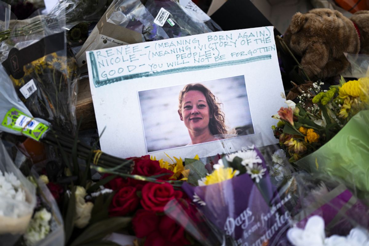 A memorial for Renee Nicole Good, who was fatally shot by a U.S. Immigration and Customs Officer. The memorial has a picture of her in the center surrounded by flowers.