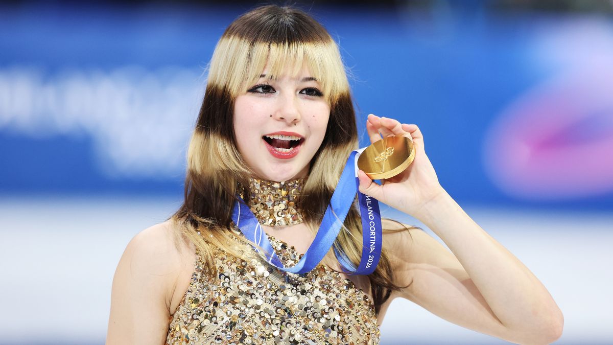 U.S. Olympic figure skater Alysa Liu holds her gold medal. 