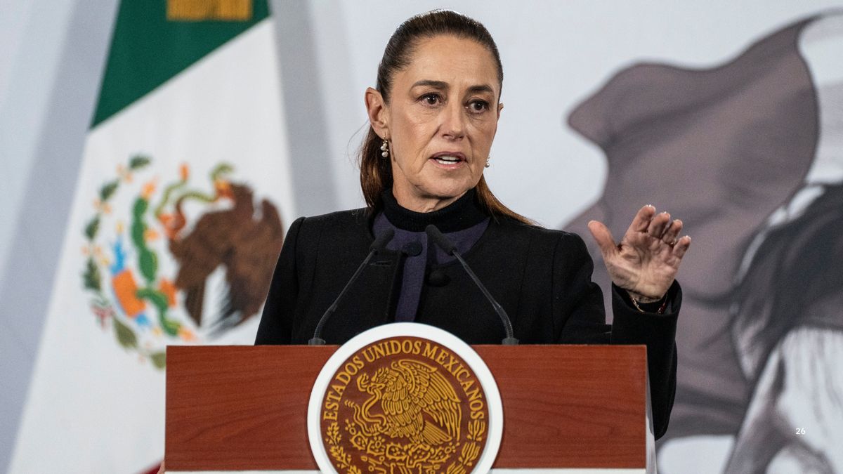 Mexico President Claudia Sheinbaum, a Latina wearing a dark outfit, gestures as she speaks during a daily morning briefing at Palacio Nacional on Feb. 23, 2026 in Mexico City, Mexico.