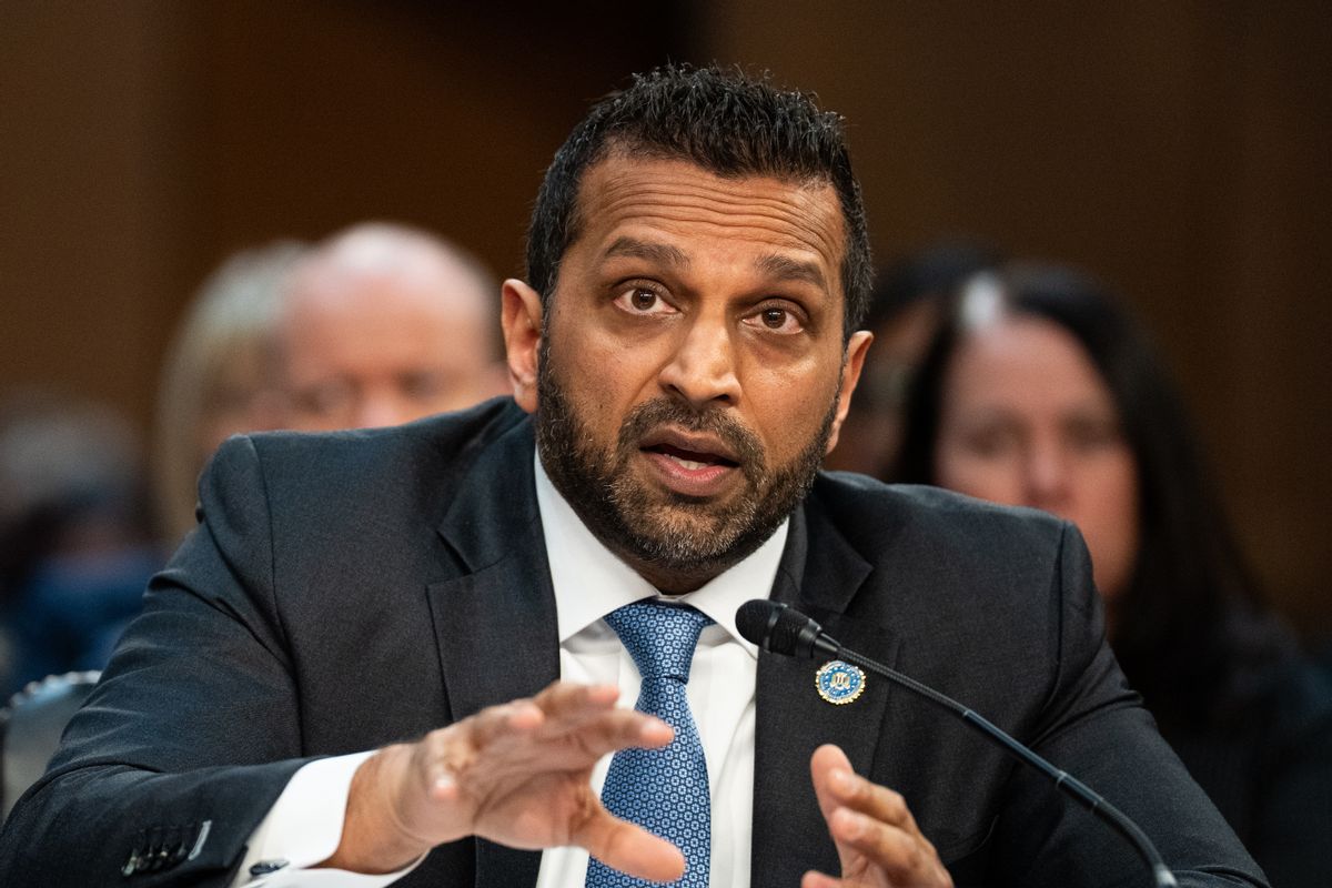FBI Director Kash Patel speaks into a microphone during a hearing.