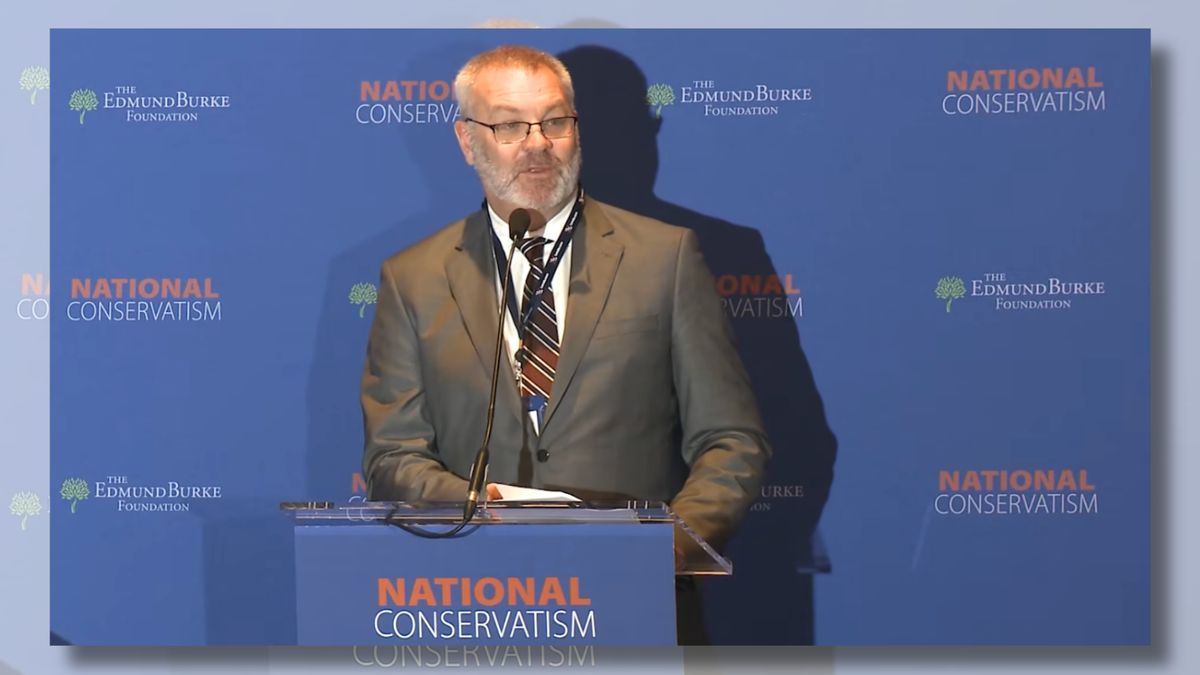 Image shows Scott Yenor speaking at an event hosted by the Claremont Institute.