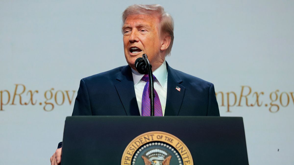 U.S. President Donald Trump speaks in front of a podium. 