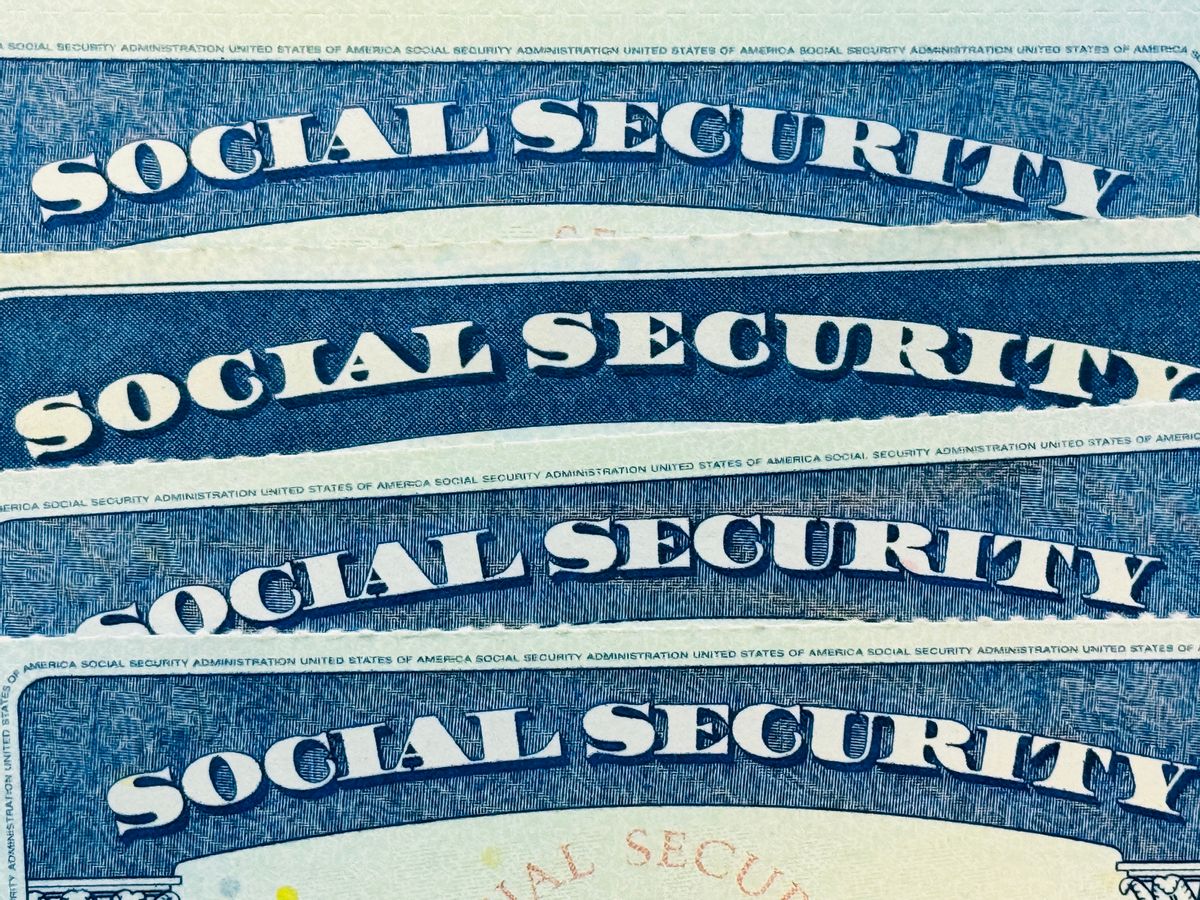 Image shows Social Security cards.