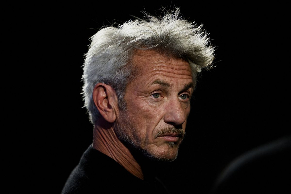 Actor Sean Penn, an older white man with gray hair, looking off to the side.