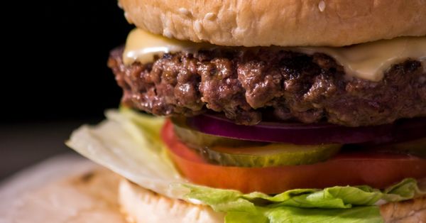 Close-up of hamburger on a black background