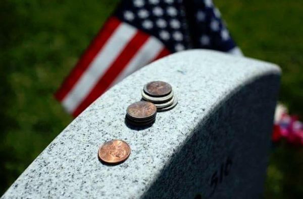 coins on military graves headstones cemetery cemeteries funeral coin