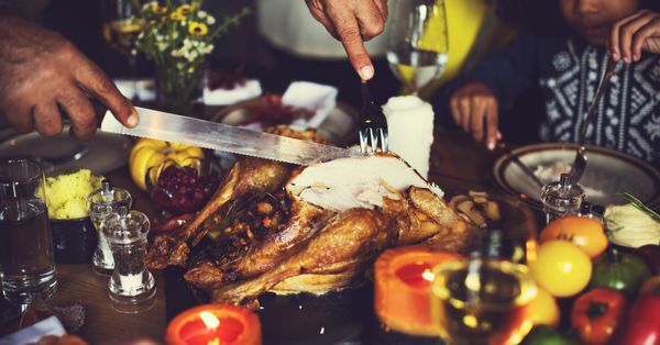 Family eating Thanksgiving dinner