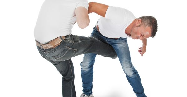 Man getting kicked between legs