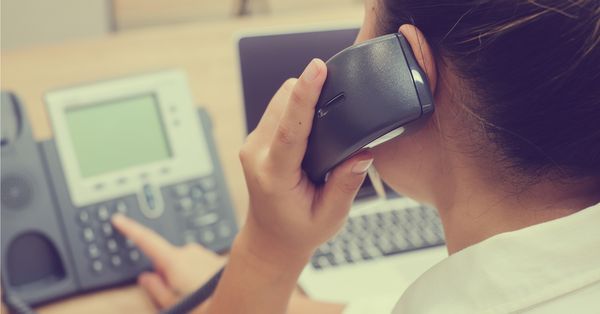 Woman answering phone at call center