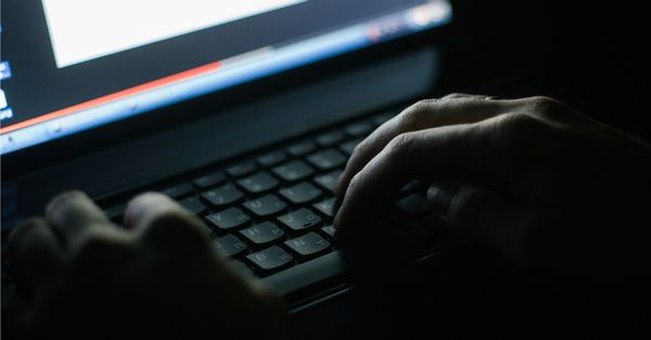 Hacker at keyboard