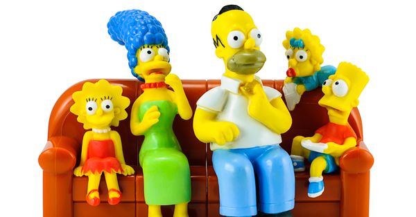 Models of the Simpsons family sitting on their couch