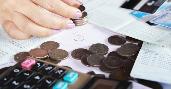 Woman calculating bills