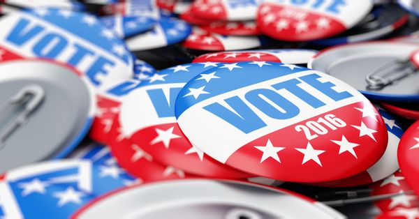 Pile of buttons reading "VOTE."