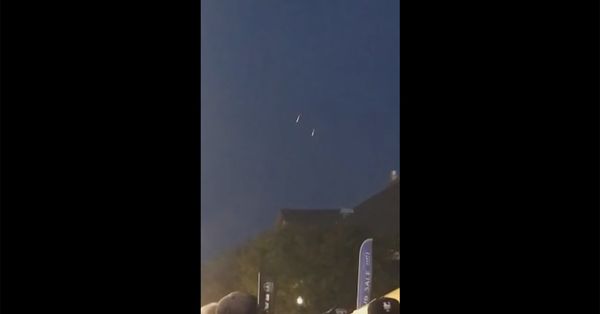 Still from a video purporting to show UFOs over Oklahoma City (but actually show Navy paratroopers over Utah)