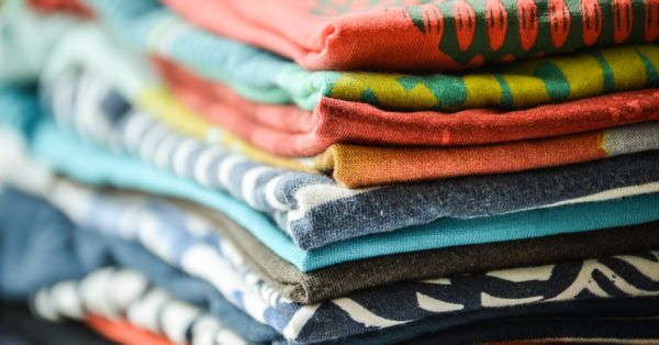 A stack of folded T-shirts.
