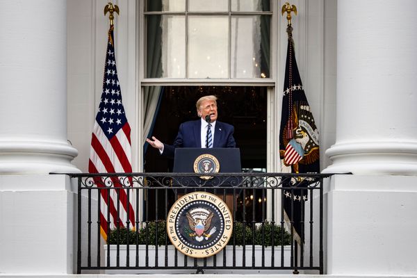 Trump on balcony