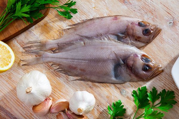 Raw,Seafood,,Fresh,Megrim,Sole,Flatfish,On,Wooden,Board