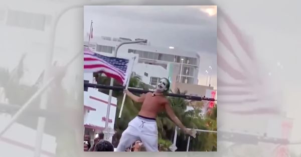 Man dressed as Joker declares COVID is over