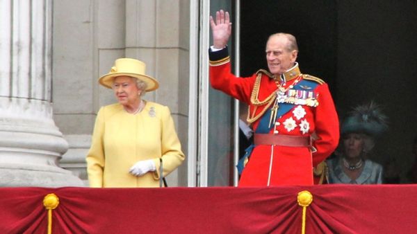 A photo shows Queen Elizabeth laughing after Prince Philip "pranked" her by disguising himself as a palace guard.