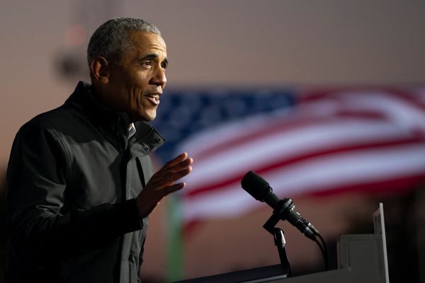 A labeled satire website claimed that Obama would be speaking at a Benghazi memorial hiking trail dedication with Hillary Clinton.