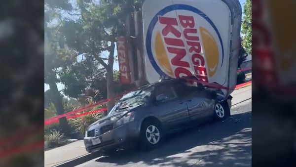 A Burger King sign fell onto a Nissan Quest minivan in Richmond California in May 2021.