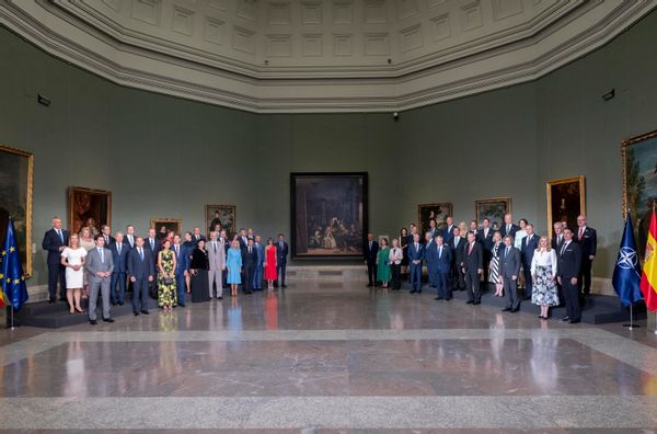 NATO leaders with artwork