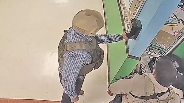 Surveillance video really did show a man who may have been a police officer using a hand sanitizer station while other officers waited a total of 80 minutes before engaging the shooter at Robb Elementary School in Uvalde, Texas.