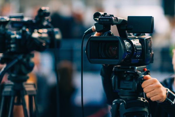 Camera, Electronics, Person