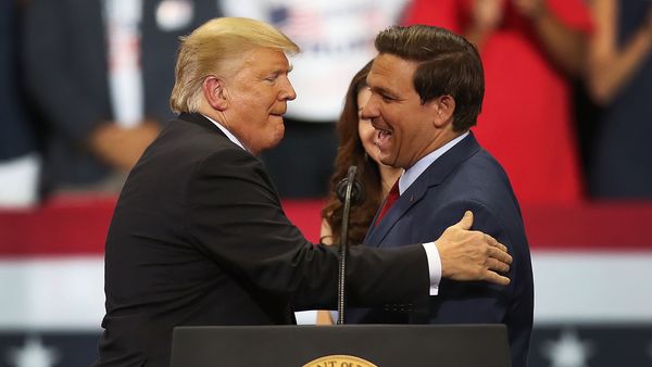 Donald Trump reshared a meme that claimed to show a photo of Ron DeSantis grooming high school girls with alcohol as a teacher.