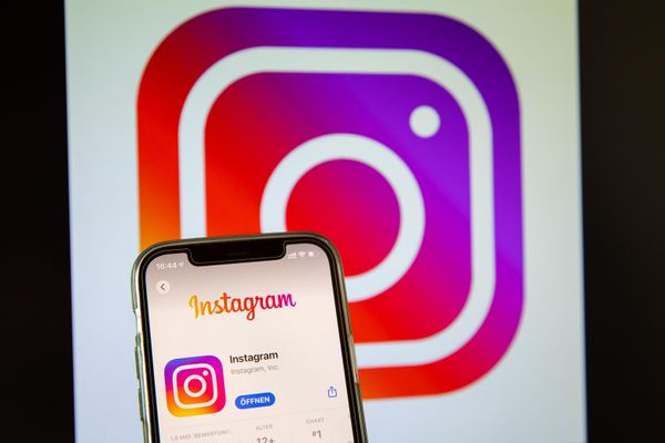 The Instagram app is shown in front of a full image of the Instagram icon.