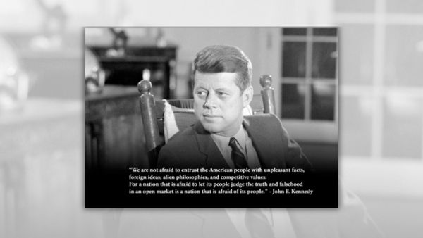 A white man sits in a rocking chair. Towards the bottom of the picture, it says, ""We are not afraid to entrust the American people with unpleasant facts, foreign ideas, alien philosophies, and competitive values. For a nation that is afraid to let its people judge the truth and falsehood in an open market is a nation that is afraid of its people." The quote is attributed to John F. Kennedy, Jr.
