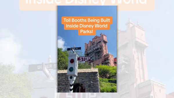White text on an orange background says "Toll Booths Being Built Inside Disney World Parks!" over a stop light and a building that says "Hollywood Tower."