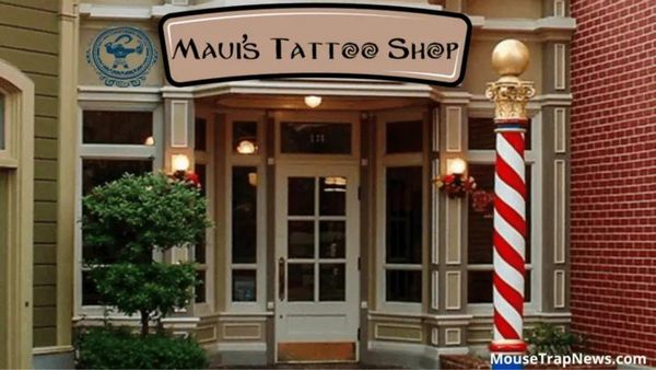 The outside of a store says "Maui's Tattoo Shop." 