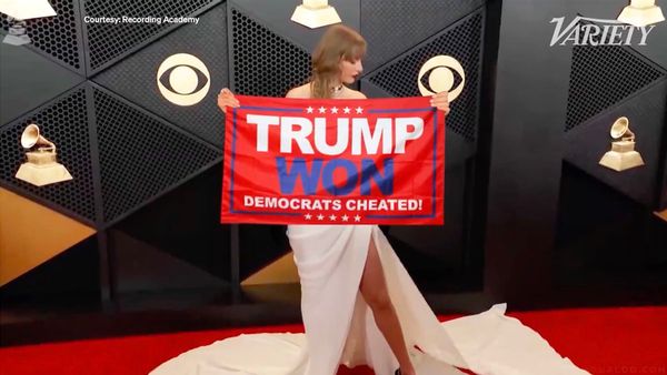 A video purportedly showed Taylor Swift holding up a flag on the red carpet at the 2024 Grammy Awards that said Trump won and Democrats cheated.