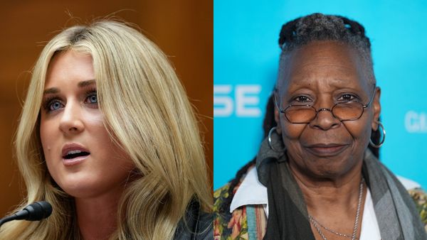 A white and Black women are pictured. The white woman has a microphone pictured in front of her.