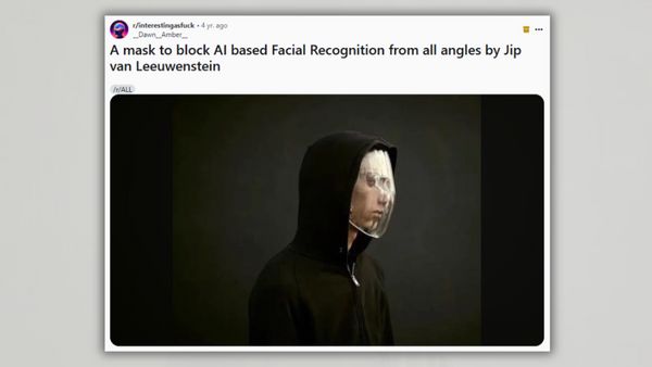 A clear mask is over what appears to be a person that is wearing a black hoodie.
